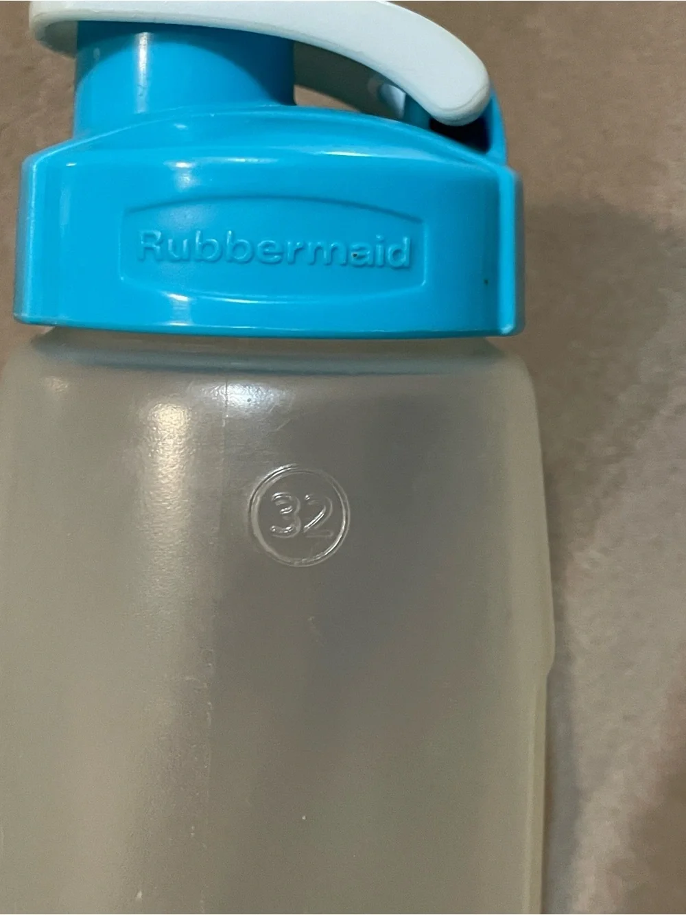 Tupperware Set of Clear Storage Bottles with Green and Blue Lids